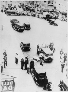 lossy-page1-445px-Bullet-riddled_taxi_and_the_bodies_of_two_gangsters_in_a_New_York_City_street_after_a_gun_battle_with_police,_1931_-_NARA_-_541879.tif